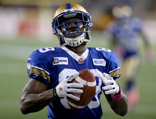Winnipeg Blue Bombers' Clarence Denmark (89) catches a touchdown pass against the BC Lions' during first half CFL football in Winnipeg, Saturday, October 25, 2014. (TREVOR HAGAN/WINNIPEG FREE PRESS)