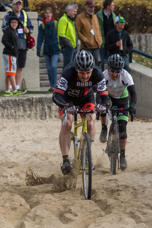 Craig Fraser from Calgary, AB and team DeJong Design p/b RoAD pedals through the grueling sand pit portion of the cycle-cross event being held at The Forks Sunday. 141026 - Sunday, October 26, 2014 - (MIKE DEAL / WINNIPEG FREE PRESS)