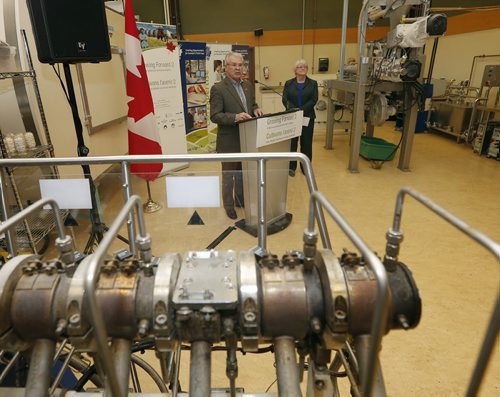 BIZ .Left.Federal Minister of Agriculture Gerry Ritz  with CiGi CEO Joanne Buth announces in Wpg today  $15 million of support to the Canadian International Grains Institute  for market development  , technical and customer support    Oct. 27 2014 / KEN GIGLIOTTI / WINNIPEG FREE PRESS