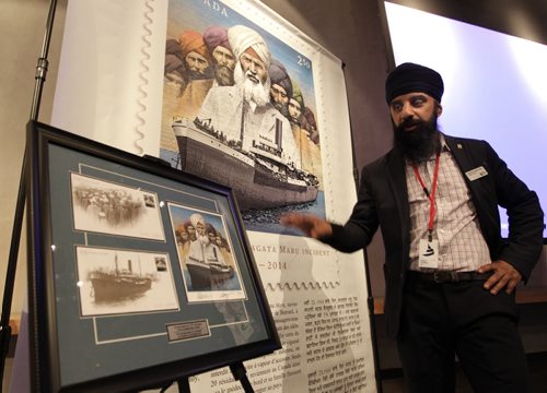 Pardeep Singh Nagra, director of the Mississauga-based Sikh Heritage Museum of Canada by part of the "Lions of the Sea" exhibit that explores the tragic Komagata Maru incident on the 100th anniversary. He is by the Canada Post stamp that honoured the victims of the tragic event. The travelling exhibit and lecture at the Canadian Museum for Human Rights is on display Monday. Pardeep overcame barriers of discrimination in the boxing ring, in the lead-up to the Sydney 2000 Olympics, Nagra launched a successfully legal challenge after being barred from fighting at the national championships because he refused to shave his beard. Kevin Rollason story  Wayne Glowacki/Winnipeg Free Press Oct.27  2014