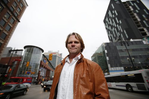 October 27, 2014 - 141027  -  Winnipeg architect Brent Bellamy photographed on Portage Avenue Monday, October 27, 2014. John Woods / Winnipeg Free Press