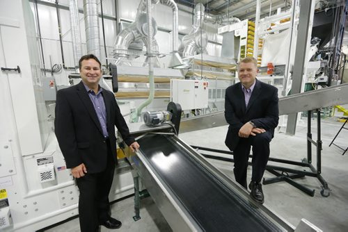 Left Cory Baseraba COO and right Calvin Sonntag CEO  BrettYoung Seeds a Winnipeg company that has been around since 1934 countries is celebrating its 80th anniversary with a grand opening of a new multi-million dollar facility. The company processes more than 50 million pounds of seed and exports to more than 40 countries. Martin Cash¬ | Business Reporter/ Columnist Oct. 28 2014 / KEN GIGLIOTTI / WINNIPEG FREE PRESS