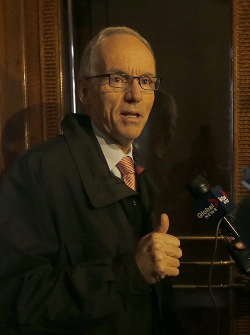 Thumbs Up ,Greg Selinger Watch at MB. Legislature  , media chases  Minister Steve Ashton down the halls of the legislature Bldg as he was on his way to lunch , he maintains an optimistic view going forward no matter what happens.  Oct. 28 2014 / KEN GIGLIOTTI / WINNIPEG FREE PRESS