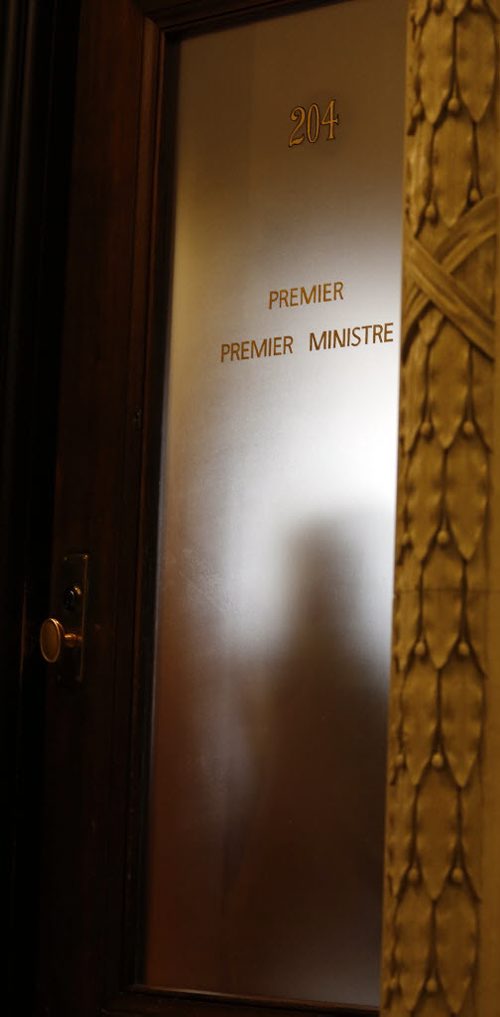 Greg Selinger resignation  watch went on all morning and afternoon as advisors  came and went  and shadows passed across the inside of the Premiers Office , and media camped outside . Oct. 28 2014 / KEN GIGLIOTTI / WINNIPEG FREE PRESS