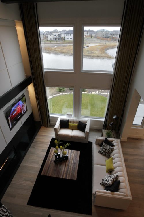 Homes. 129 Autumnview Drive in South Pointe. View of the living room on the main floor. The realtor is  Rob Hutchison. Todd Lewys story. Wayne Glowacki/Winnipeg Free Press Oct.28   2014