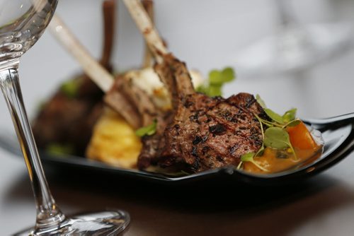 October 28, 2014 - 141028  -  Lamb Chops at Tapastry in the Niakwa Country Club, Tuesday, October 28, 2014. Grilled lamb chops served with a twice baked goat cheese soufflé. Dressed with sautéed tomatoes and basil. John Woods / Winnipeg Free Press
