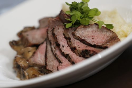 October 28, 2014 - 141028  - Strip Sirloin Steak at Tapastry in the Niakwa Country Club, Tuesday, October 28, 2014. Strip loin steak grilled medium rare and served over asiago mashed potatoes and topped with a herbed wild mushroom ragout. John Woods / Winnipeg Free Press