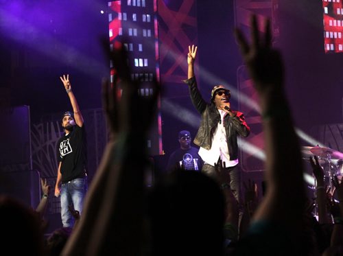 Kardinal Offishall at right performs to the 16,000 students attending the WE Day Event in the MTS Centre Wednesday. Nick Martin  story. Wayne Glowacki/Winnipeg Free Press Oct.29   2014