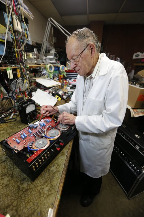 49.8 INTERSECTION - Columbus Radio  - Bill Yaworski featured  for an Intersection feature on Columbus Radio - perhaps the top electronics shop in town, in biz since 1969 - owner Bill Yaworski is 81 years old and still pulls 60-hour weeks. Story is going to be told in pictures for the most part - so lotsand lots of shots of Bill at work - he gets reel-to-reel players, turntables, amps etc etc sent to him from all over North America because he is the fix-it guy. - radios are piled on top of amps piled on top of speakers - it's a wonder he finds anything, everything is so jammed tight, because of his workload.So shots of radios etc. from yester-year (he specializes in bringing electronics from the 30s and 40s back to life) - Bill also has a microscope he brings out to see how much life is left in a stylus (he has about 10,000 styluses on supply - drawers and drawers Oct. 27 2014 / KEN GIGLIOTTI / WINNIPEG FREE PRESS