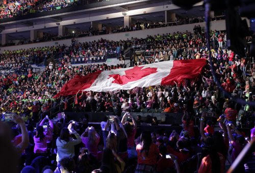 A Canadian flag is passed around the MTS Centre by Manitoba students at the WE Day event in the MTS Centre Wednesday. Nick Martin  story. Wayne Glowacki/Winnipeg Free Press Oct.29   2014