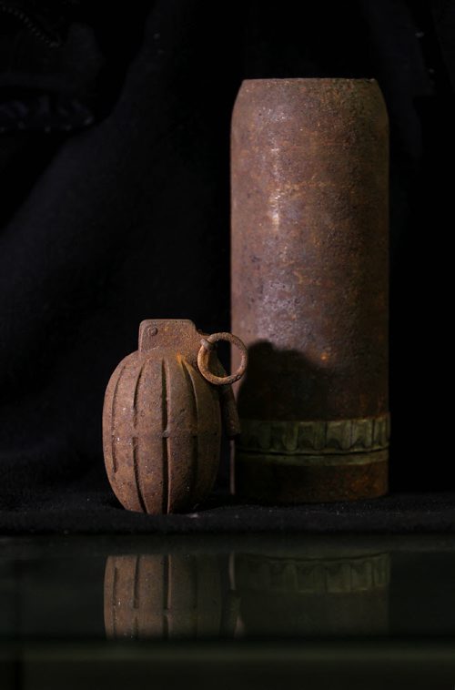 49.8 World War 1 / Remembrance Day Feature  Photo's of artifacts from the Legion House Museum at 134 Marion Street. No. 5 training Mills Bomb  and 18 - pounder Shrapnel Shell found at Camp Hughes.  Oct 29,  2014 Ruth Bonneville / Winnipeg Free Press