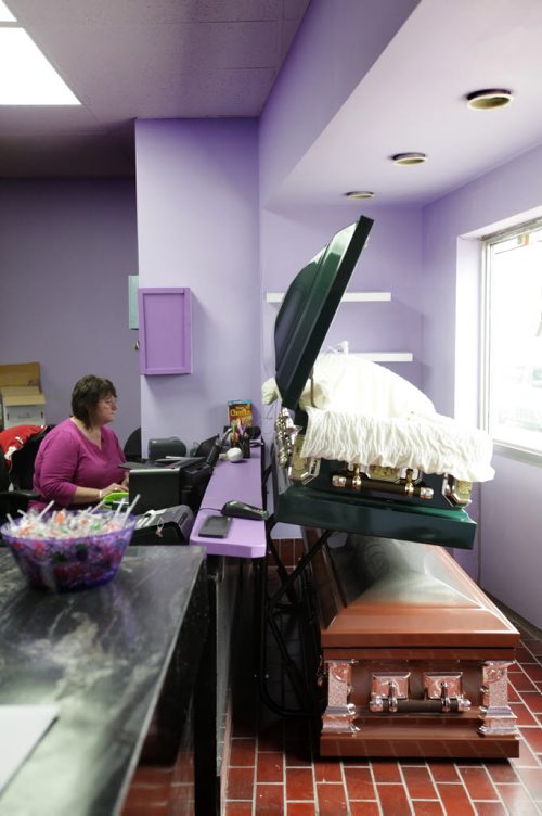 Lesley Borys, production manager at Bloomex a new online florist that also sells coffins and urns along with fresh cut flowers in the old Kelekis Restaurant.  Oct 30,  2014 Ruth Bonneville / Winnipeg Free Press