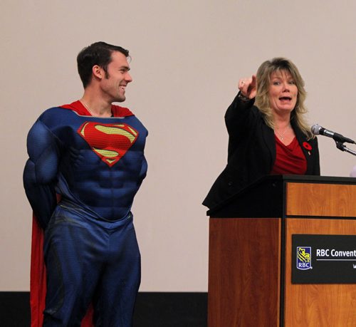 2014 Central Canada Comic Con at the RBC Convention Centre. Federal minister Shelly Glover on main stage with her son Michael Strickland dressed as superman. She gave opening remarks. BORIS MINKEVICH / WINNIPEG FREE PRESS October 31, 2014