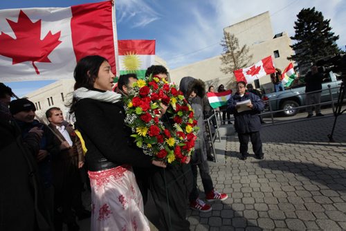 Kurdish residents in Winnipeg lay wreath at cenotaph on Memorial Blvd before marching to the Forks in support of their brethren in Kobani. See Ashley's story. Nov 1,  2014 Ruth Bonneville / Winnipeg Free Press
