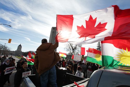 Kurdish residents in Winnipeg rally on Memorial Blvd at cenotaph before marching to the Forks in support of their brethren in Kobani. See Ashley's story. Nov 1,  2014 Ruth Bonneville / Winnipeg Free Press