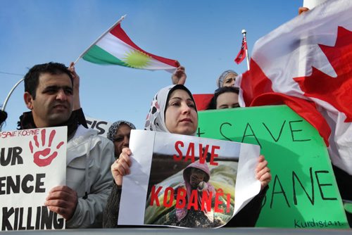 Kurdish residents in Winnipeg rally on Memorial Blvd at cenotaph before marching to the Forks in support of their brethren in Kobani. See Ashley's story. Nov 1,  2014 Ruth Bonneville / Winnipeg Free Press