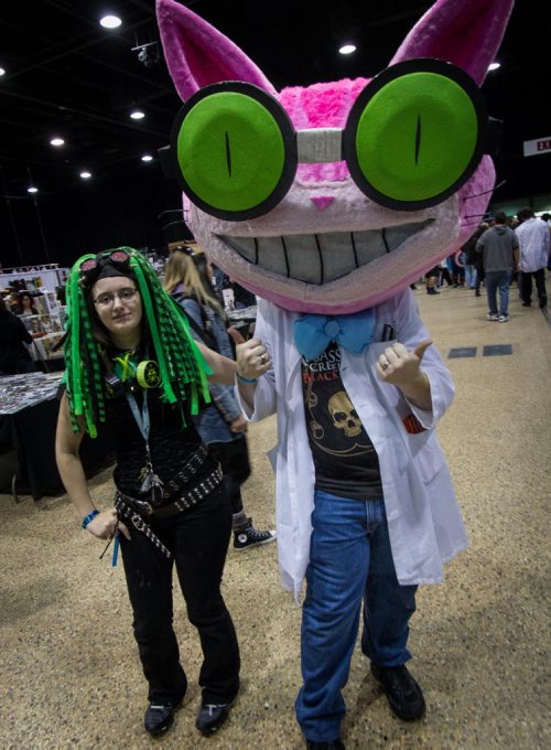Building elaborate costumes for Winnipeg's Comic Con (C4) is becoming more mainstream every year. Miranda Gillies (left) with her friend Jack Martinuk who is dressed as Professor Genki from Saints Row. 141102 - Sunday, November 02, 2014 -  (MIKE DEAL / WINNIPEG FREE PRESS)