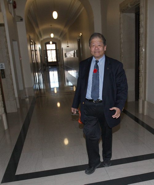 MLA Ted Marcelino,Tyndal Park leaves Premier Selingers office Monday morning. Later five cabinet ministers who challenged Premier Greg Selinger on his leadership resigned from cabinet today. - See Bruce Owen Larry Kusch story  Nov 03, 2014   (JOE BRYKSA / WINNIPEG FREE PRESS)