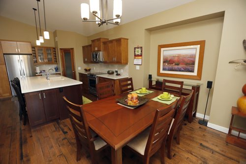 HOMES RESALE .  kitchen , eating area , 25 Hunterbrook RD in Bridgewater Forest. Todd Lewys story  NOV. 3 2014 / KEN GIGLIOTTI / WINNIPEG FREE PRESS