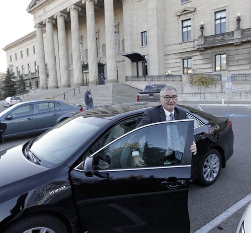 NDP MLA Stan Struthers arrives at the Manitoba Legislative building Monday morning.  Wayne Glowacki/Winnipeg Free Press Nov. 3 2014