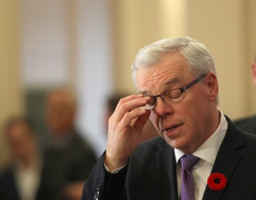 After a turbulent day with 5 senior ministers resigning from cabinet Premier Greg Selinger takes a moment during a ceremony where 5 new cabinet ministers were sworn in at the Manitoba Legislature Monday afternoon  - See Bruce Owen story  Nov 03, 2014   (JOE BRYKSA / WINNIPEG FREE PRESS)