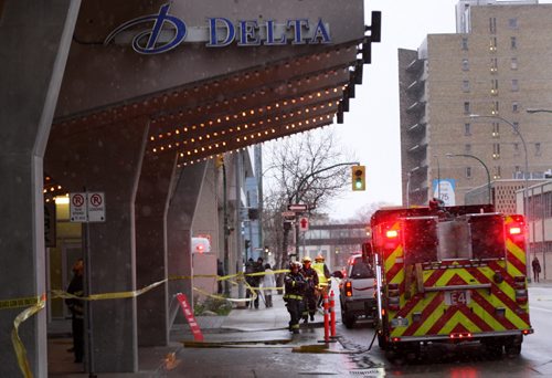 The Delta Hotel on St Marys Ave is being evacuated because of a hazmat call- Police have several streets in downtown Winnipeg blocked off  - Winnipeg Fire on scene with Hazmat gear-Breaking News Nov 04, 2014   (JOE BRYKSA / WINNIPEG FREE PRESS)