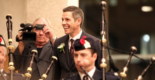 An emotional Brian Bowman is piped into City Counsil Chambers for the first time as Mayor Tuesday evening. See Mary Agnes Welch story.  November 4, 2014 - (Phil Hossack / Winnipeg Free Press)