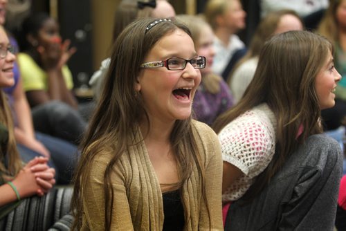 Victoria Brimble shows her excitement with other members of the  Winnipeg Youth Chorus after their last rehearsal before heading off to New York City to perform at Alice Tully Hall in Lincoln Center during the US's Veteran's Day weekend to sing a Holocaust Oratorio  written by Winnipeg composer Zane Zalis.  Standup photo Nov 5,  2014 Ruth Bonneville / Winnipeg Free Press
