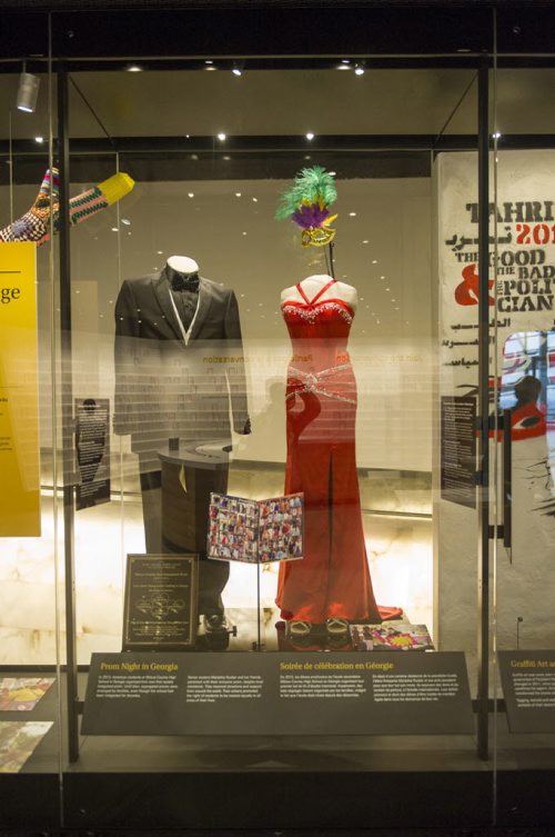 141106 Winnipeg - DAVID LIPNOWSKI / WINNIPEG FREE PRESSS  People tour the Canadian Museum for Human Rights Thursday November 6, 2014. The museum will have all of the exhibits open to the public on November 11, 2014.  Prom dress from 2013 Georgion High School Prom, first non segregated Prom