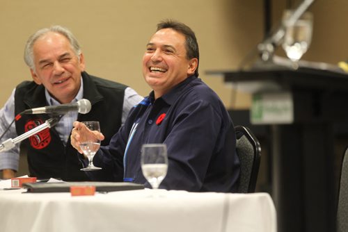 AFN CANDIDATES DEBATE - Two of the three candidates for for National Chief of the Assembly of First Nations, Perry Bellegarde (poppy) Ghislain Picard share some laughs at debate in Winnipeg Thursday evening.  Leon Jourdain (not in photo) is the third candidate.   Nov 6,  2014 Ruth Bonneville / Winnipeg Free Press