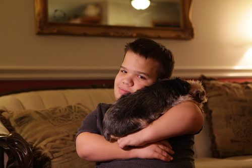Sixteen year old David holds and plays with his little dog Cole at home.  Lisa Funks son David is a dwarf, family is filing a human rights complaint for the way hes allegedly treated at school in River East Transcona School Division and for the services the division is not providing for him.   Nov 6,  2014 Ruth Bonneville / Winnipeg Free Press