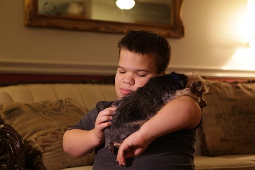 Sixteen year old David holds and plays with his little dog Cole at home.  Lisa FunkÄôs son David is a dwarf, family is filing a human rights complaint for the way heÄôs allegedly treated at school in River East Transcona School Division and for the services the division is not providing for him.   Nov 6,  2014 Ruth Bonneville / Winnipeg Free Press