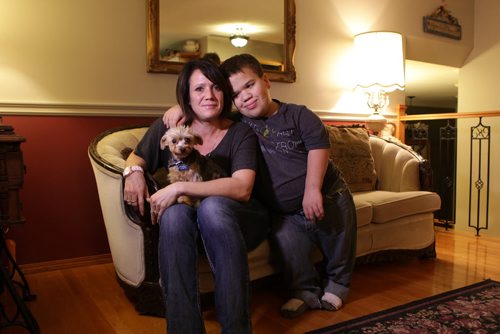 Photo's taken of Sixteen year old David, his mom Lisa and their little dog Cole at home.  Lisa FunkÄôs son David is a dwarf, family is filing a human rights complaint for the way heÄôs allegedly treated at school in River East Transcona School Division and for the services the division is not providing for him.   Nov 6,  2014 Ruth Bonneville / Winnipeg Free Press