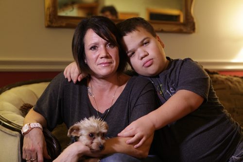 Photo's taken of Sixteen year old David, his mom Lisa and their little dog Cole at home.  Lisa FunkÄôs son David is a dwarf, family is filing a human rights complaint for the way heÄôs allegedly treated at school in River East Transcona School Division and for the services the division is not providing for him.   Nov 6,  2014 Ruth Bonneville / Winnipeg Free Press