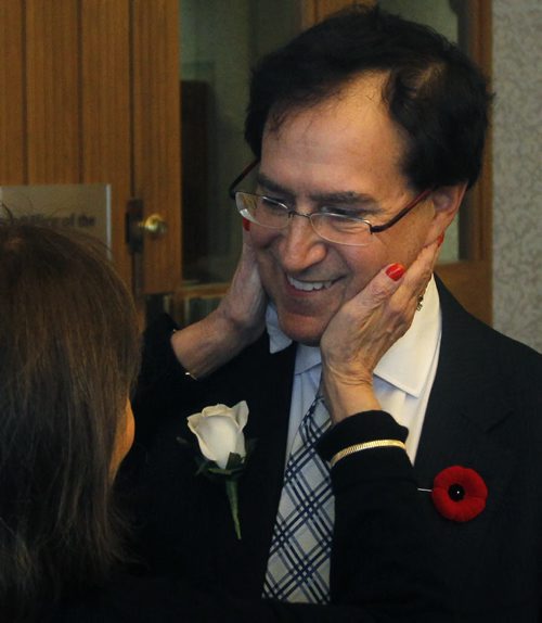 Councillor Marty Morantz for Charleswood-Tuxedo is congratulated by his mother Pearl Morantz after his swearing-in ceremony at the City Hall Friday. He could not attend Tuesday's inaugural meeting of council, where all other members were sworn in, due to the death of his father, Saul.   Bart Kives story WAYNE GLOWACKI / WINNIPEG FREE PRESS) Nov.7 2014