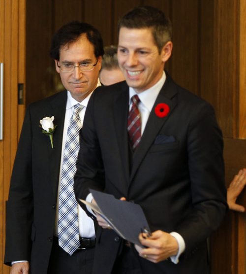 At left, Councillor Marty Morantz for Charleswood-Tuxedo with Mayor Brian Bowman at  his swearing-in ceremony at the City Hall Friday. He could not attend Tuesday's inaugural meeting of council, where all other members were sworn in, due to the death of his father, Saul.   Bart Kives story WAYNE GLOWACKI / WINNIPEG FREE PRESS) Nov.7 2014