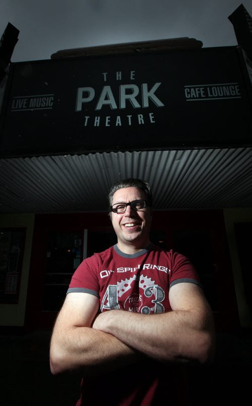 Erick Casselman poses outside the "Park", which was recently named Venue of the Year at the Western Canadian Music Awards - the theatre turns 100 years old next year - story will be about Casselman's involvement since taking over a decrepit theatre. See Dave Sanderson's tale. November 7, 2014 - (Phil Hossack / Winnipeg Free Press)