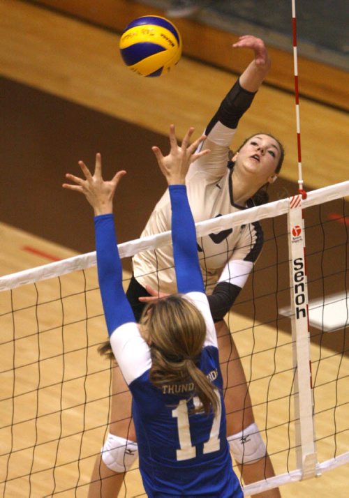 University of Manitoba Bisons Kalena Schulz spikes at UBC Thunderbirds Alessandra Gentile during  second set Friday night action at the Investors Group- Athletic Centre See Story Nov 07, 2014   (JOE BRYKSA / WINNIPEG FREE PRESS)