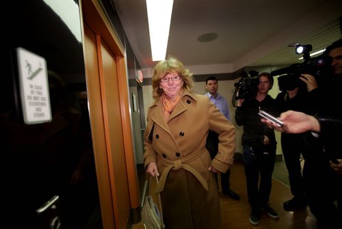 NDP cabinet minister Erna Braun refuses to say a word to media's questions on her way out of  NDP meeting Saturday morning at  head office.  See Larry Kusch story.  Nov 8,  2014 Ruth Bonneville / Winnipeg Free Press