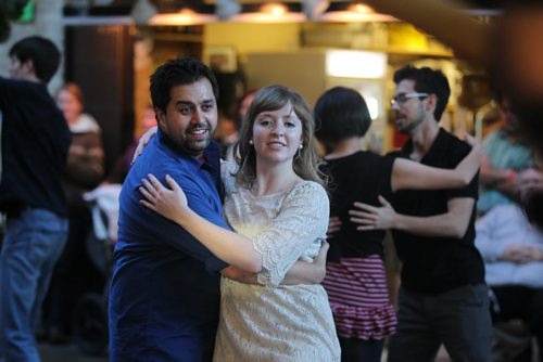 Emily Pohl and Suneil Pandey (owner of hepcatstudio) swing dance together with other dancers in the centre Court of The Forks Saturday afternoon during the Hepcat Dance Studio's five year anniversary celebration which offered a  free dance event for all levels of dancers to take part in.  Standup photo. Nov 8,  2014 Ruth Bonneville / Winnipeg Free Press