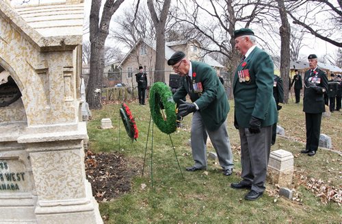 Veterans Gerry Woodman (left) and Bob Geddes (right) of the Royal Winnipeg Rifles lay a wreath at the Regimental Memorial on the grounds of St. John's Cathedral on the 131st birthday of the formation of the 90th ÄúWinnipegÄù Battalion of Rifles.  141109 November 09, 2014 Mike Deal / Winnipeg Free Press
