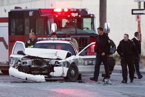 November 9, 2014 - 141109  -  Emergency personal were called to this MVC, which involved a police cruiser, at the intersection of Princess and Logan Sunday, November 9, 2014. John Woods / Winnipeg Free Press