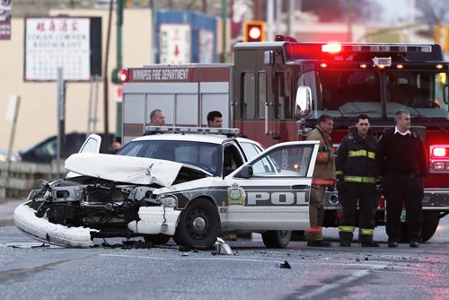 November 9, 2014 - 141109  -  Emergency personal were called to this MVC, which involved a police cruiser, at the intersection of Princess and Logan Sunday, November 9, 2014. John Woods / Winnipeg Free Press