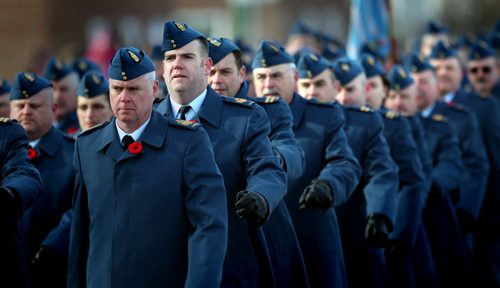 Hundreds gathered (Veterans and citizens) And then lined Portage ave as veterans marched to the St James Legion from the Bruce Park Cenotaph Tuesday morning after the annual Remembrance Day service. See story. November 11, 2014 - (Phil Hossack / Winnipeg Free Press)