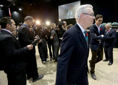 Premier Greg Selinger after avoiding questions following the Remembrance Day Service at the Winnipeg Convention Centre, Tuesday, November 11, 2014. (TREVOR HAGAN/WINNIPEG FREE PRESS)