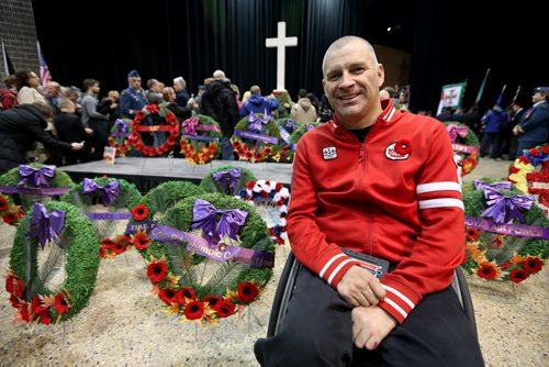 Paralympian Jared Funk, a wheelchair rugby athlete from the 2012 games in London, at the Remembrance Day Service at the Winnipeg Convention Centre, Tuesday, November 11, 2014. (TREVOR HAGAN/WINNIPEG FREE PRESS)