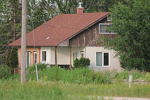 BORIS MINKEVICH / WINNIPEG FREE PRESS  070819 Possible armed standoff scene on McGregor Farm Road just north of Bricker Ave. in East St. Paul. RCMP used their SWAT team and robot in the operation. This is the house they surrounded. A dog wondered onto the property and was later fetched by it's owner.