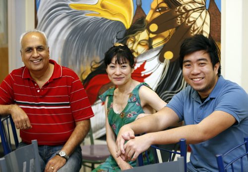 Volunteers column for the Nov. 17 issue features four volunteers from Winnipeg Harvest. These volunteers are involved with the training programs that Harvest offers its clients (computer training, health + yoga, etc.). The name of one of my main contacts is (l-r) Arvind Naran, Marina Shen , Emmanuel Verri . NOV. 12 2014 / KEN GIGLIOTTI / WINNIPEG FREE PRESS