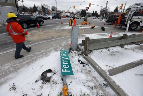 Stdup Weather . Ferry Rd. at Ness Ave was the scene of two separate mvc's during the early afternoon  took out two different sets of traffic lights. Intersections around the city were  iced over and polished all over the city.  Police and fire were on scene . NOV. 12 2014 / KEN GIGLIOTTI / WINNIPEG FREE PRESS