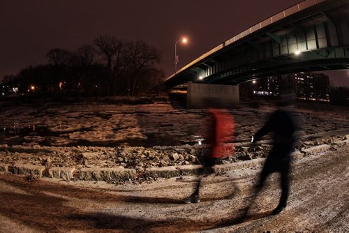Joggers on an early evening run along the River Walk that follows the Assiniboine River just east of the Donald Street Bridge where a sixteen-year-old girl was attacked by two men who have been arrested and charged with attempted murder and sexual assault.  141112 November 12, 2014 Mike Deal / Winnipeg Free Press